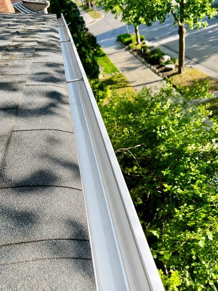 Clear, debris-free gutter after cleaning