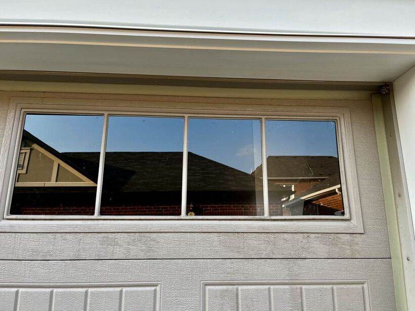 Clean garage transom window after cleaning