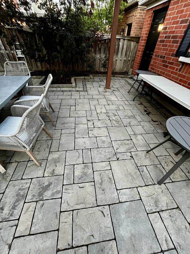 Backyard stone patio, evening
