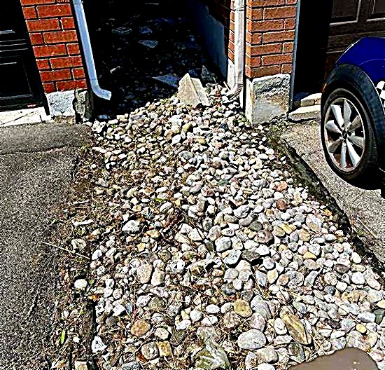 Cleared gravel bed after landscaping